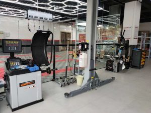 The Power Duo Car Lifts and Tire Changers in Auto Repair Shops