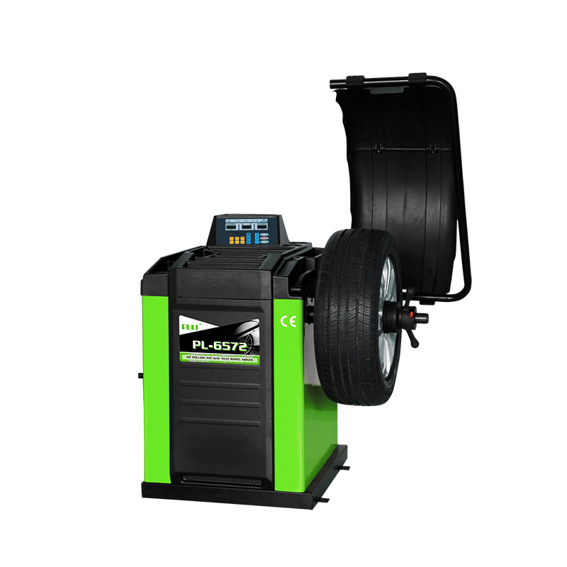 PL-6572 self-calibrating computer wheel balancer 1 PL-6572 self-calibrating computer wheel balancer