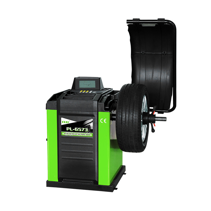 PL-6573 self-calibrating computer wheel balancer 1 PL-6573 self-calibrating computer wheel balancer